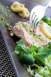 Salmon dish with salad