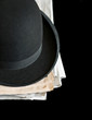 Black Bowler hat on newspapers