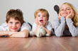 Three kids on the floor