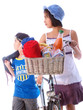 children on the way to the swimming pool with the bike