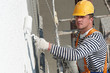 builder facade painter at work builder facade painter at work