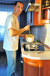 Photo: Man in kitchen Man in kitchen