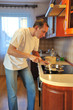 Photo: Man in kitchen Man in kitchen