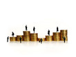 golden coins with silhouettes of business people