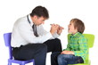 Doctor examining boy