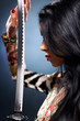 Foto: Young woman with samurai sword Young woman with samurai sword