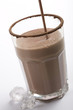 pouring chocolate milkshake