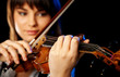 blurred female violinist