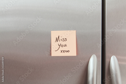 Photo: Sticky Note on a Refrigerator Sticky Note on a Refrigerator