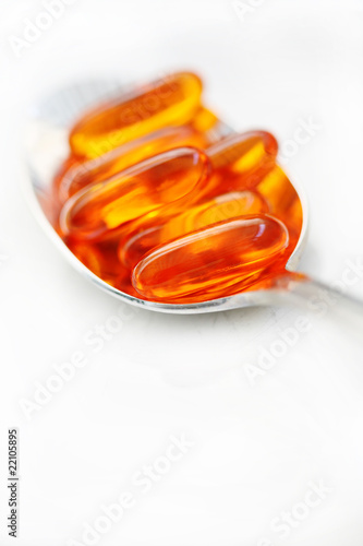 Photo: Vitamin Gel Caps On Spoon Vitamin Gel Caps On Spoon