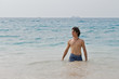 Athletic man in the surf of the Pacific Ocean in Costa Rica.