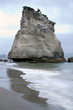 weathered rock and waves