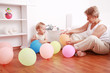 Foto : Cute little boy playing with his grandmother Cute little boy playing with his grandmother