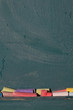 Coloured chalk and chalkboard