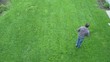 Man Pushing Mower