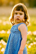 Portrait of Cute Girl in Field