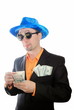 The guy with dollars in a suit
