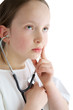 Photo: Little girl with a white coat and stethoscope Little girl with a white coat and stethoscope
