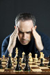Man at chess board