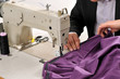 Tailor using industrial sewing machine. Tailor using industrial sewing machine.