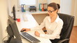 Beautiful young businesswoman at office