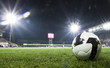 Soccer ball in stadium at night
