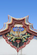 Traditional Chinese temple building against blue sky
