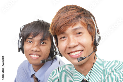 Photo: Two Asian call center agents Two Asian call center agents