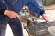 Metalwork, worker with rasp close up