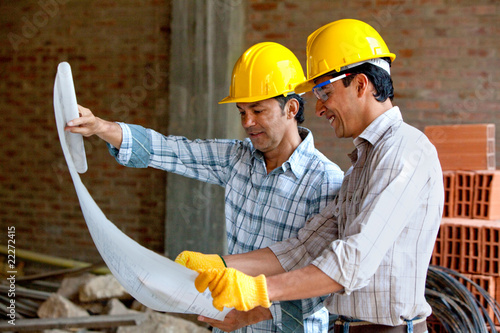 Photo: Architects at a construction site Architects at a construction site