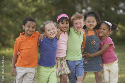 Photo: Portrait of multi-ethnic children hugging Portrait of multi-ethnic children hugging