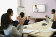 Multi-ethnic businesspeople having video conference