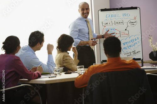 Photo: Multi-ethnic businesspeople having meeting Multi-ethnic businesspeople having meeting