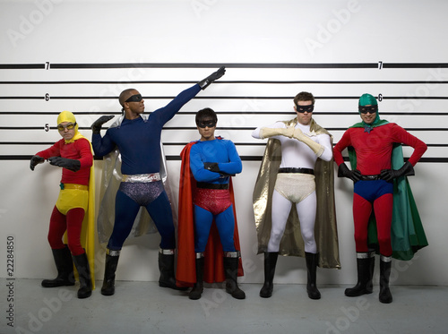 Photo: Multi-ethnic superheroes standing police line up Multi-ethnic superheroes standing police line up