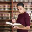 Hispanic female lawyer reading