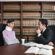 Male lawyer talking to injured client