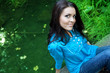 One happy beautiful young woman outdoors