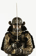 Asian man wearing samurai armor