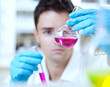 young male researcher carrying out scientific research in a lab