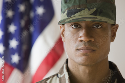 Photo: African male soldier in front of American flag African male soldier in front of American flag