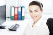 Beautiful young businesswoman at office
