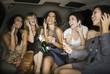 Multi-ethnic women talking on cell phones
