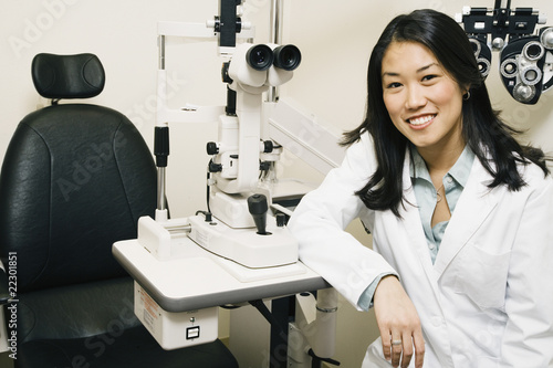 Photo: Asian female optometrist in office Asian female optometrist in office