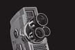 old cine camera on black