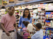 Family shopping together in grocery store