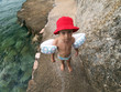 boy on a rocky beach