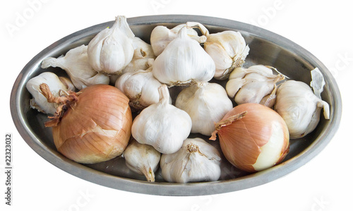 Photo: Garlic and Onions on silver tray. Garlic and Onions on silver tray.