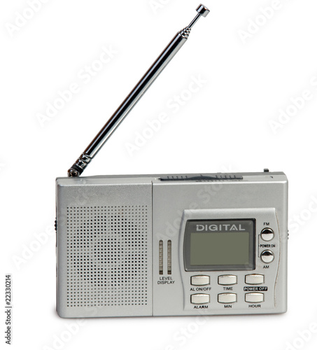 Photo: Portable transistor radio receiver on white background Portable transistor radio receiver on white background
