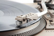 Macro shot of turntable tonearm and cartridge