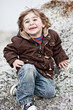 enfant garçon heureux manteau hiver sourire
